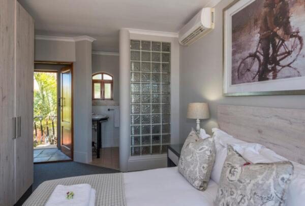 Bright room with balcony door and private bathroom